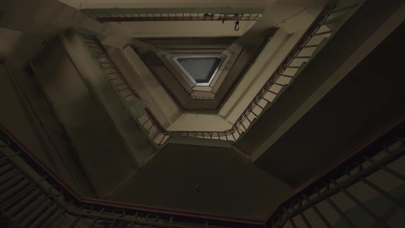 Bottom view of the stairs and many floors