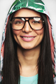 Smiling female face in glasses and hood - PhotoDune Item for Sale