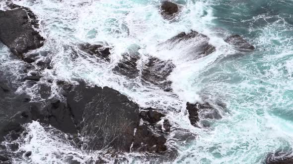 Footage of beautiful blue ocean waves crashing the rocky shore at Loch Ard Gorge 12 Apostles Coast a