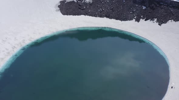 The Blue Lake in the Crater of Gorely Volcano