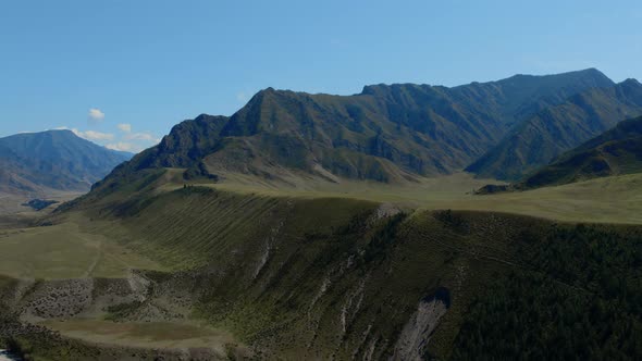 Green mountains of Altai under clear blue sky