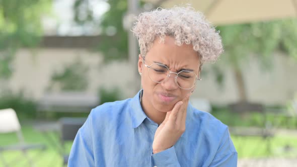 Portrait of Young African Woman Having Toothache Cavity