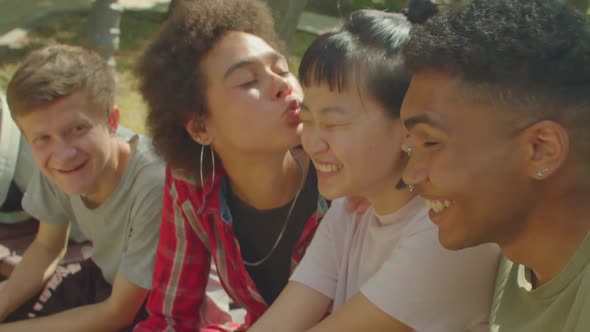 Carefree Attractive Diverse Multiracial Friends Taking Selfie Shot Outdoors