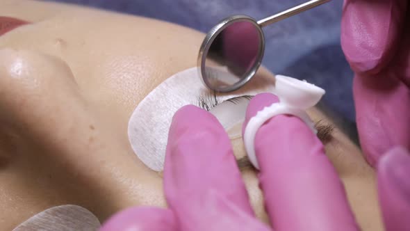 Face of a Young Girl on a Modern Eyelash Lamination Procedure in a Professional Beauty Salon