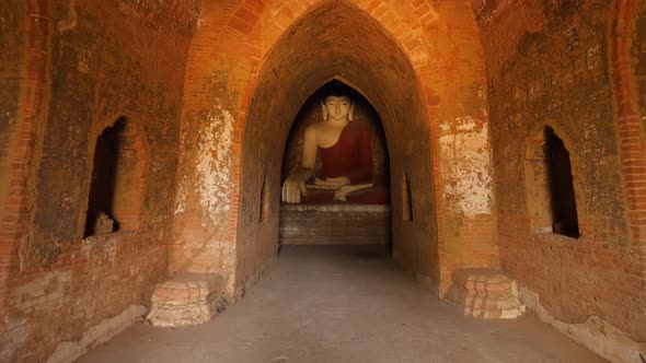 Old Buddha Statue in Traditional Burmese Temple. Buddhism Religion Concept Footage. Slowmotion