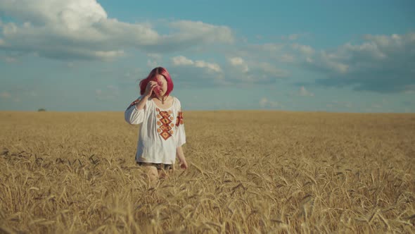 Positive Female Enjoying Leisure in Wheat Field