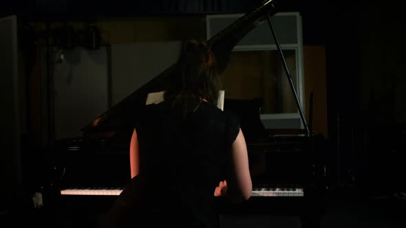 Woman playing a piano