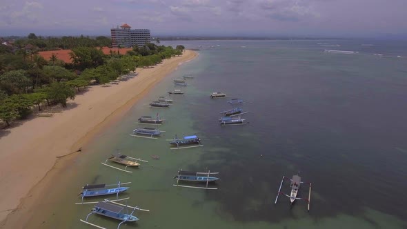 Aerial view of the bay with ships. Sanur, Bali, Indonesia.