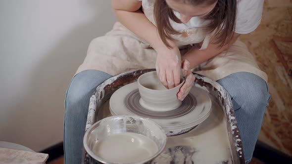 Professional Potter Working with Ceramic.