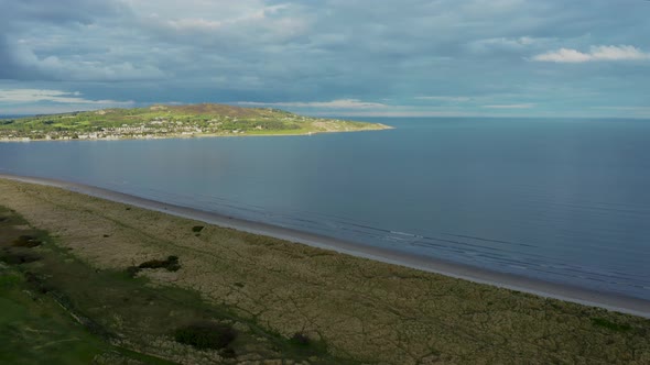 Drone aerial view moving forward over Irish beach