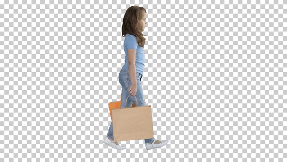 Cheerful school girl walking with shopping bags, Alpha Channel