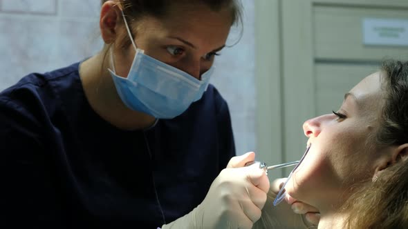 Dentist Dries and Cleans Teeth Before Installing the Bracket System Close-up