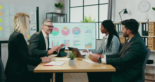 Bearded Boss of Company Finished His Speech about Strategy of Company and Giving High Five