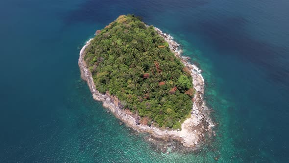 A Lonely Island Stands in the Middle of the Ocean