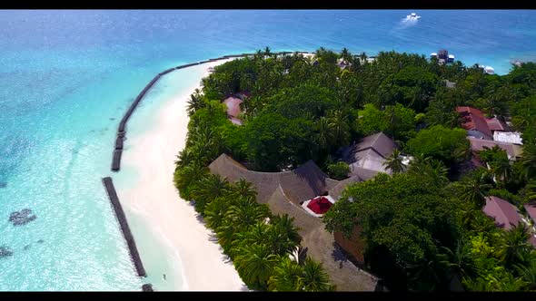 Aerial landscape of tranquil coast beach time by shallow sea with white sand background of a dayout 