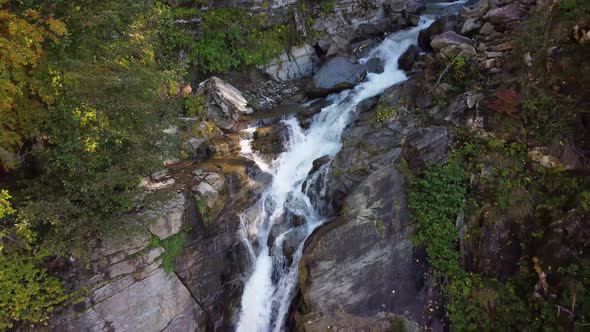 Waterfall on a mountain stream. Natural national park.