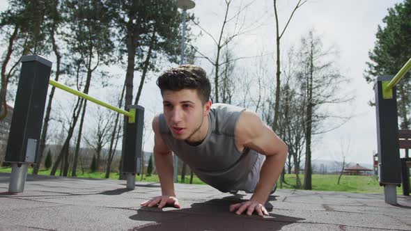 Young man doing push-ups