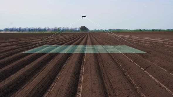 UAV Drone, Copter with Digital Camera Flies Over, Scanning Newly Plowed Agricultural Field, Smart