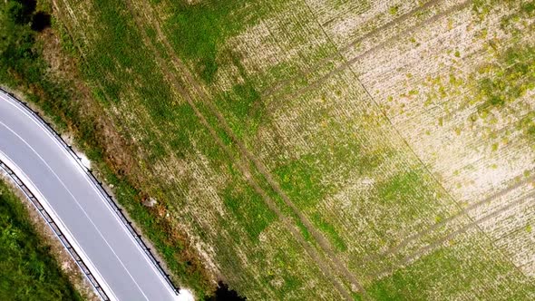 Aerial drone view of a flying over the rural agricultural landscape.