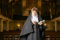 nun in church with rosary and bible - PhotoDune Item for Sale