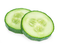 Fresh slice cucumber close-up on a white background. - PhotoDune Item for Sale