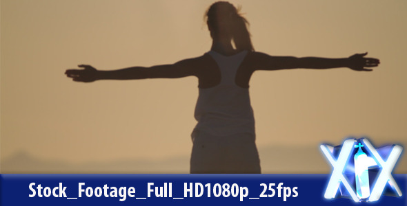 Woman Exercising On Beach