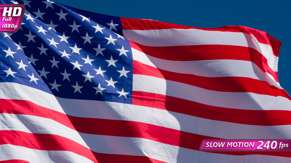 American Flag Is Flying In The Wind On A Sunny Day alt