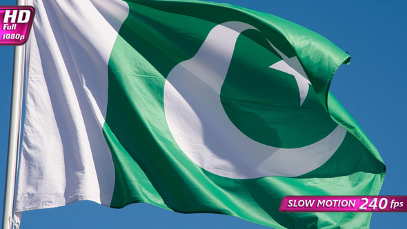 Pakistani Flag Is Flying In The Wind On A Sunny Day alt