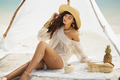 Woman Resting on the Beach During Vacation - PhotoDune Item for Sale