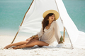 Woman Resting on the Beach During Vacation - PhotoDune Item for Sale