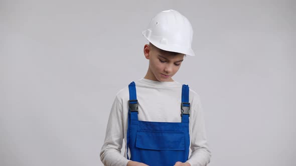 Satisfied Proud Little Foreman in Uniform and Hard Hat Counting Money Throwing Cash Crossing Hands