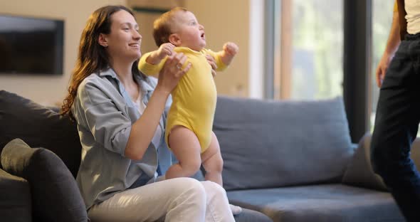 Happy Family with a Little Boy at Home