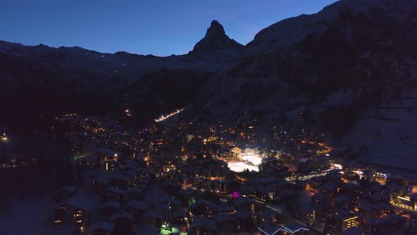 Zermatt Village and Matterhorn Mountain at Winter Night. Swiss Alps, Switzerland. Aerial View