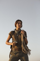 Woman Standing With a Gun Outdoors in Desert - PhotoDune Item for Sale