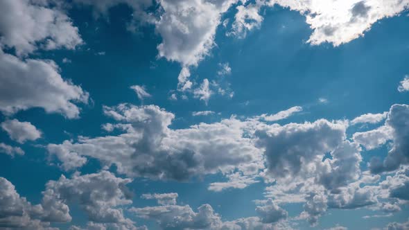 Clouds Moving in the Blue Sky Timelapse Light White Puffy Cloud Space