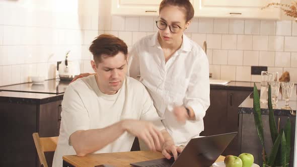 Man Work From Home His Careful Wife Next to Him