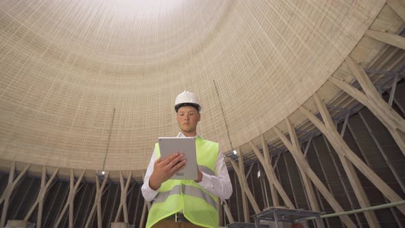 Inside of cooling tower and Working Engineer.
