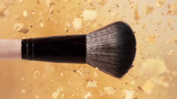 Super Slow Motion Shot of Makeup Brush and Brown Powder Explosion at 1000 Fps
