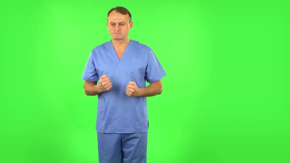 Portrait of Annoyed Medical Man. Green Screen