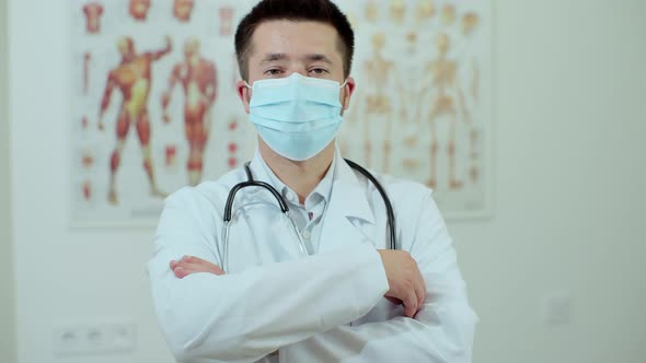 Handsome Family Doctor in Medical Office