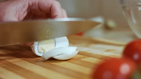 Cutting Eggs for Olive Salad Russian Salad