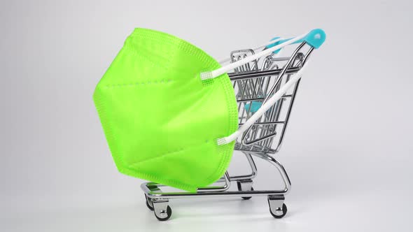 Protective medical mask KH95 on a shopping cart. 