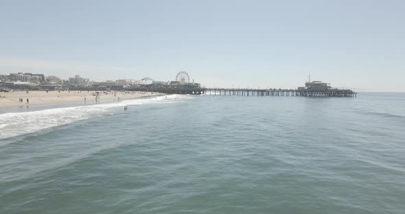 Southern California beach and Pier seen on a busy afternoon