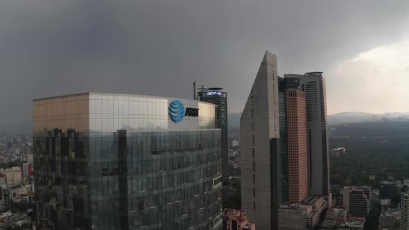 Fly Around Top of Tall Office Glass Modern Building