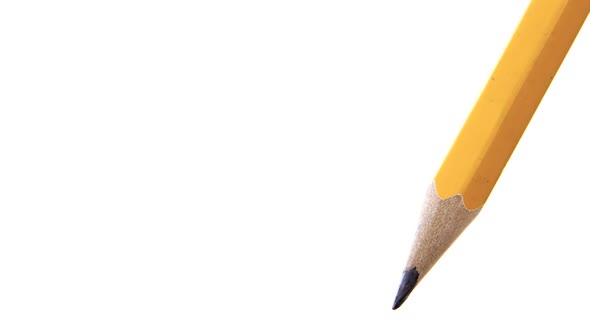 Yellow color pencil on white background