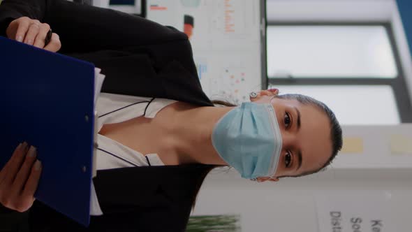 Vertical Video Pov of Business Woman with Medical Face Mask Working at Communication Project