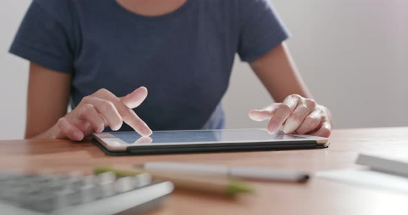 Woman use of tablet a home