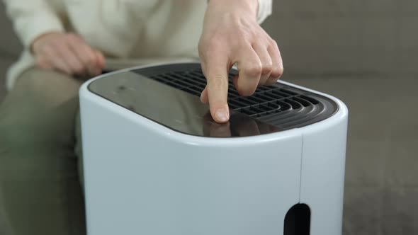 Button of air purifier. 