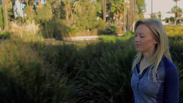 Athletic Woman Jogging In The Park