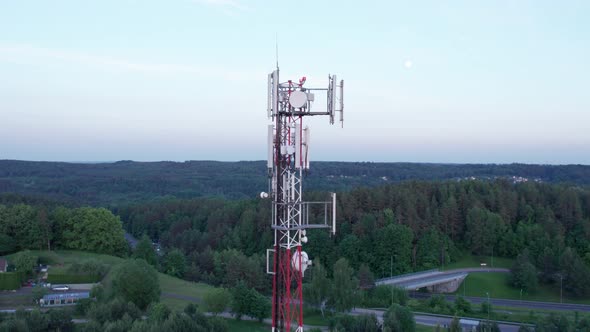 Telecommunications tower carrying broadcasting antennas for gsm, 3G, 4G and 5G cellular networks. Ae